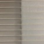 blind cleaning photo showing dirty and clean blinds